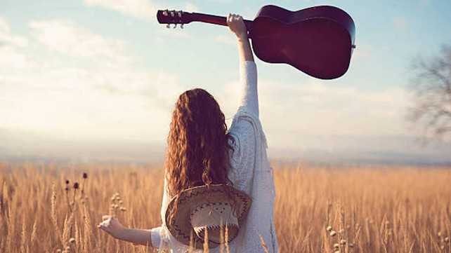 play guitar outdoors